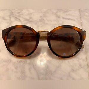 Burberry Tortoise round sunglasses with legendary plaid arms